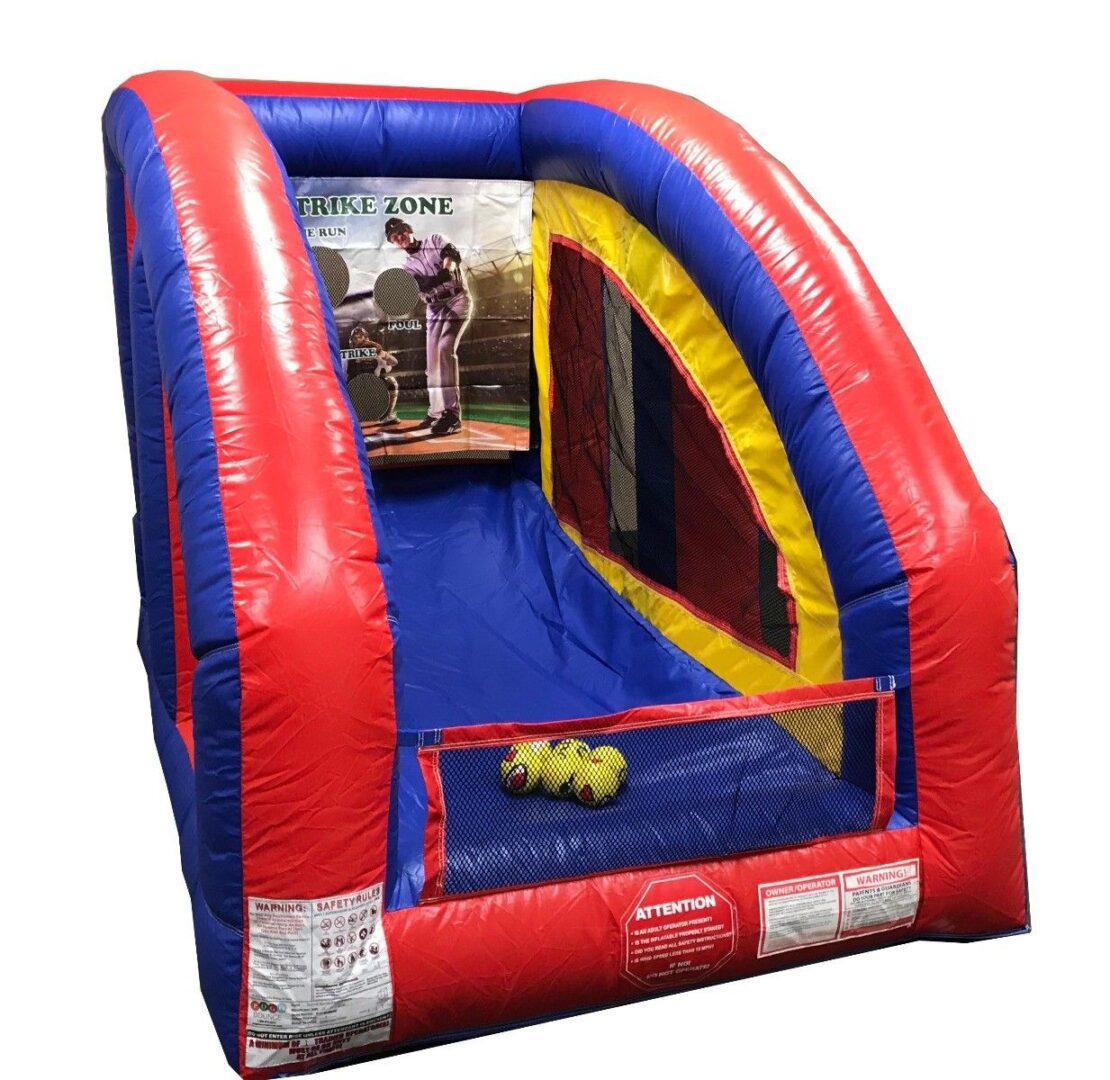 A inflatable slide with baseball players on it.